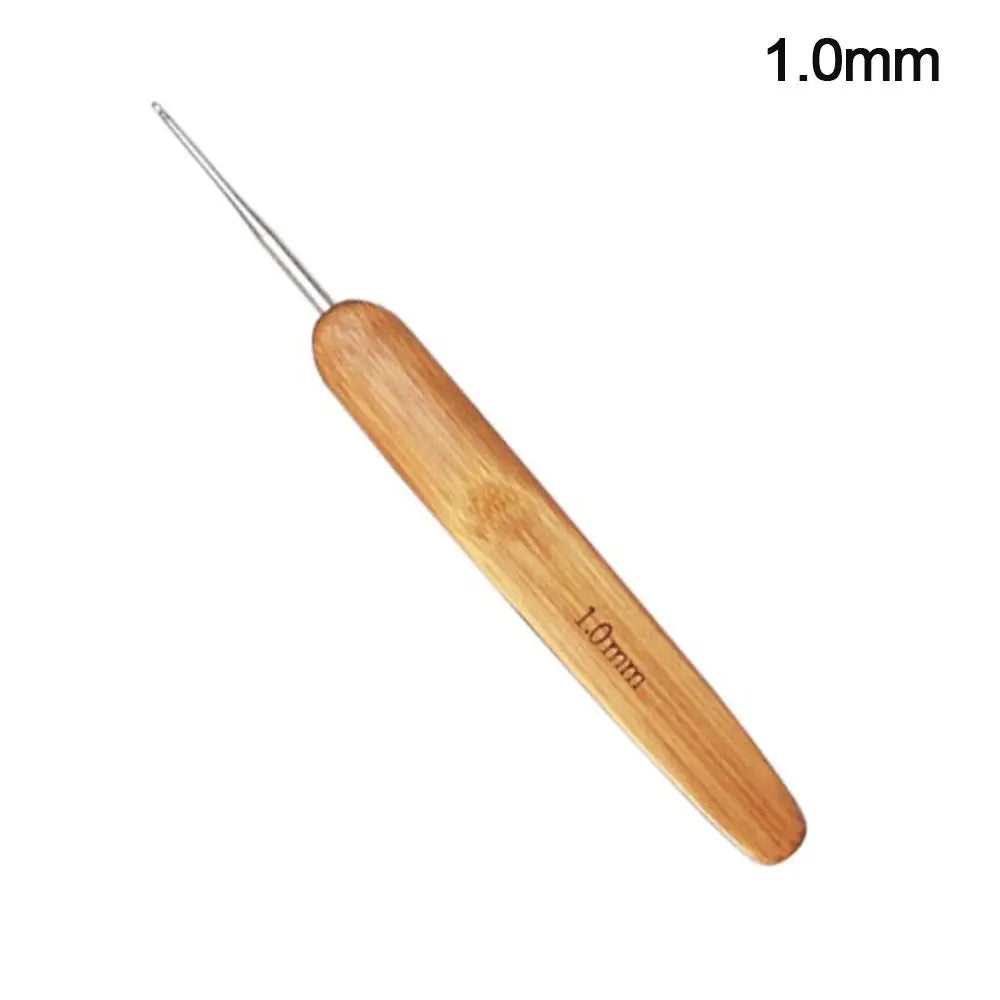 A wooden crochet and knitting needle with a pointed tip, labeled 1.0mm.