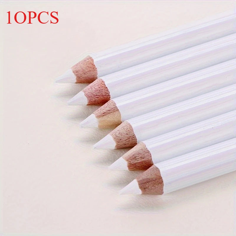 A set of ten white bamboo chalk pencils with pink and brown tips for fabric marking.