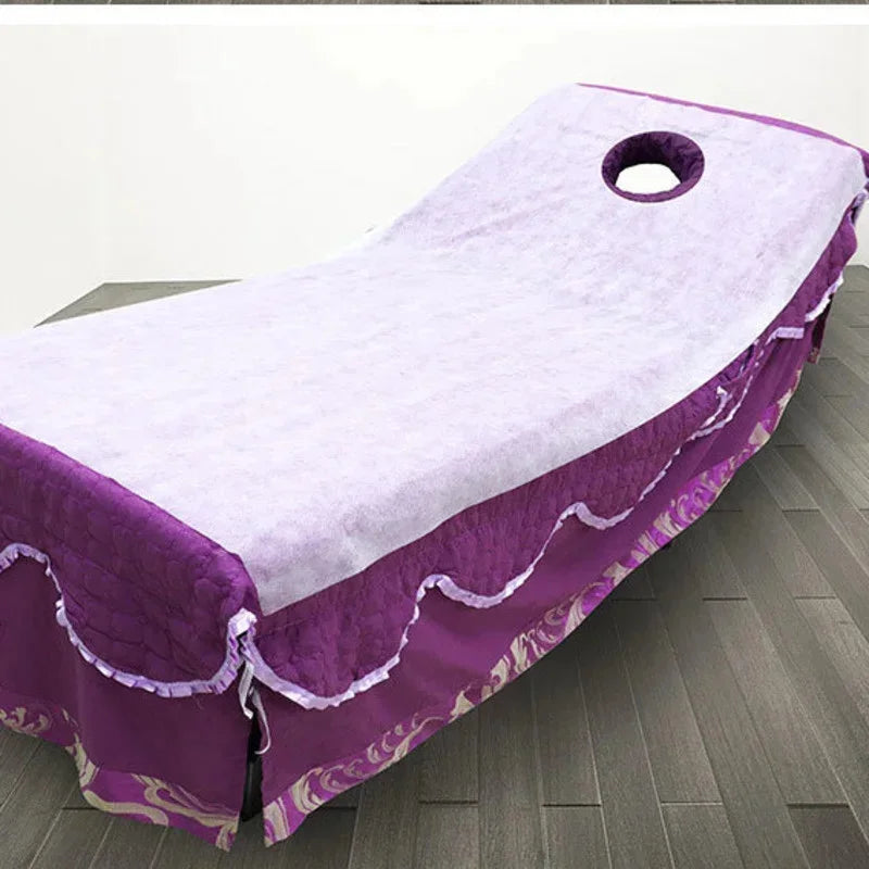Purple and white disposable non-woven beauty and salon sheet with a circular hole