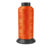 Roll of heavy duty 3-ply nylon sewing thread in bright orange