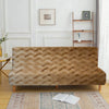 A light brown woven rattan sofa cover displayed on a wooden frame in a bright room.