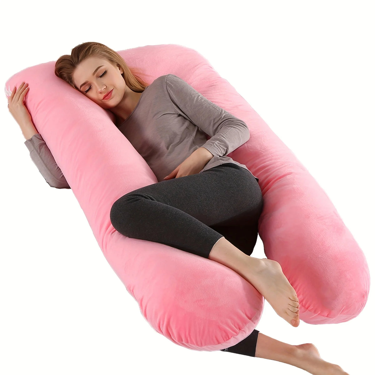 A woman lying on an ergonomic U-shape memory foam pillow for relaxation.