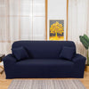 A navy blue elegant faux silk sofa cover displayed on a light wood floor.