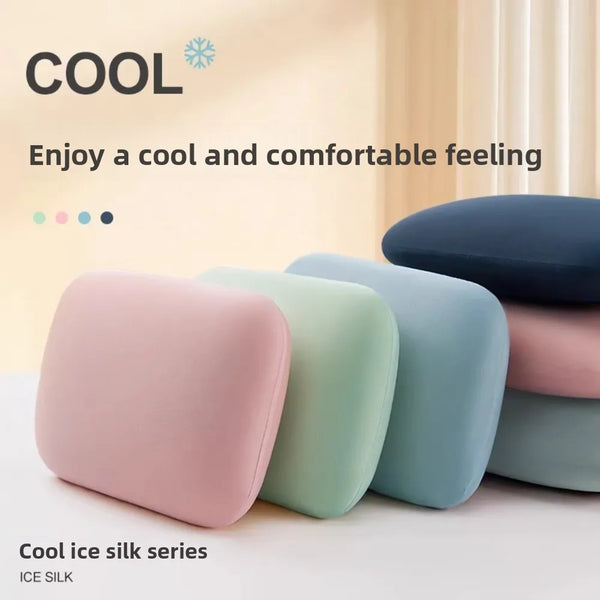 A stack of pink, mint green, and blue silicone ice silk neck and travel pillows for a cool and comfortable feeling.