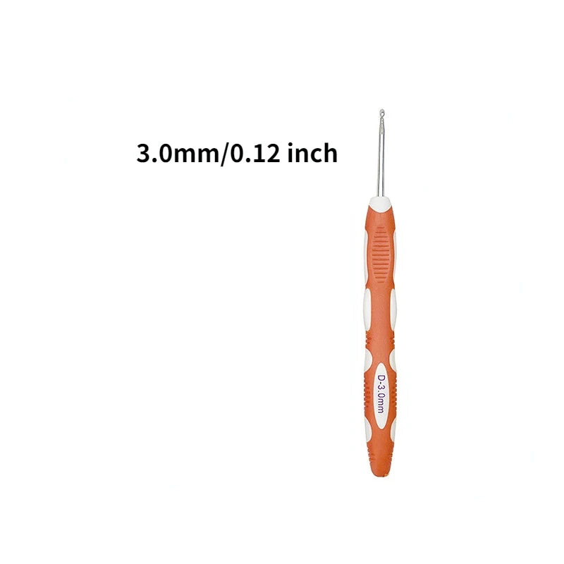 An orange ergonomic crochet hook and needle set with a 3.0mm/0.12 inch size marking.