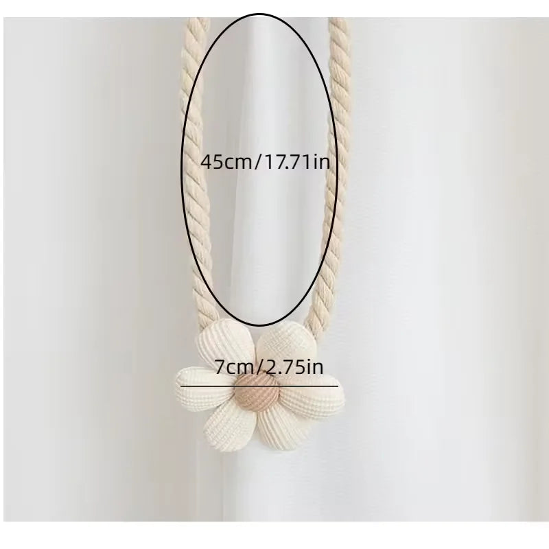 A close-up of a beige crocheted floral curtain tieback with a 45cm length and a 7cm flower detail.