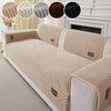 A beige minimalist anti-slip sofa cushion with striped fabric and dark brown accents is shown on a light-colored sofa.