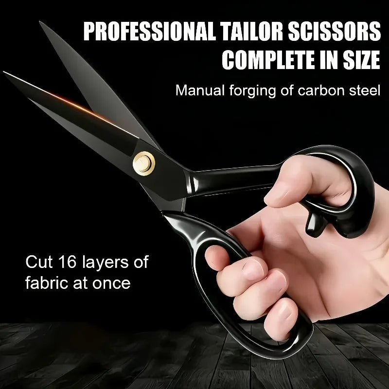 A hand holds professional tailor scissors made of carbon steel, demonstrating their size and quality.