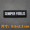 Black embroidered badge with the Latin phrase SEMPER FIDELIS on a dark gray background