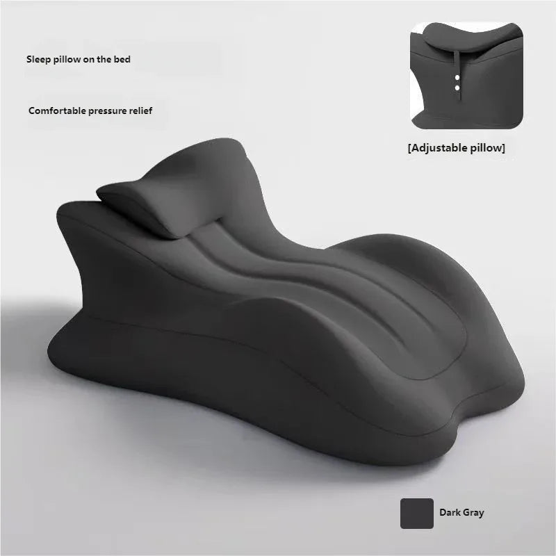 A dark gray ergonomic memory foam wedge pillow shown with an adjustable section, designed for comfortable pressure relief.