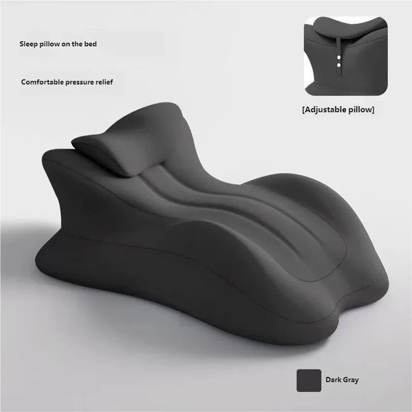 A dark gray ergonomic memory foam wedge pillow shown with an adjustable section, designed for comfortable pressure relief.