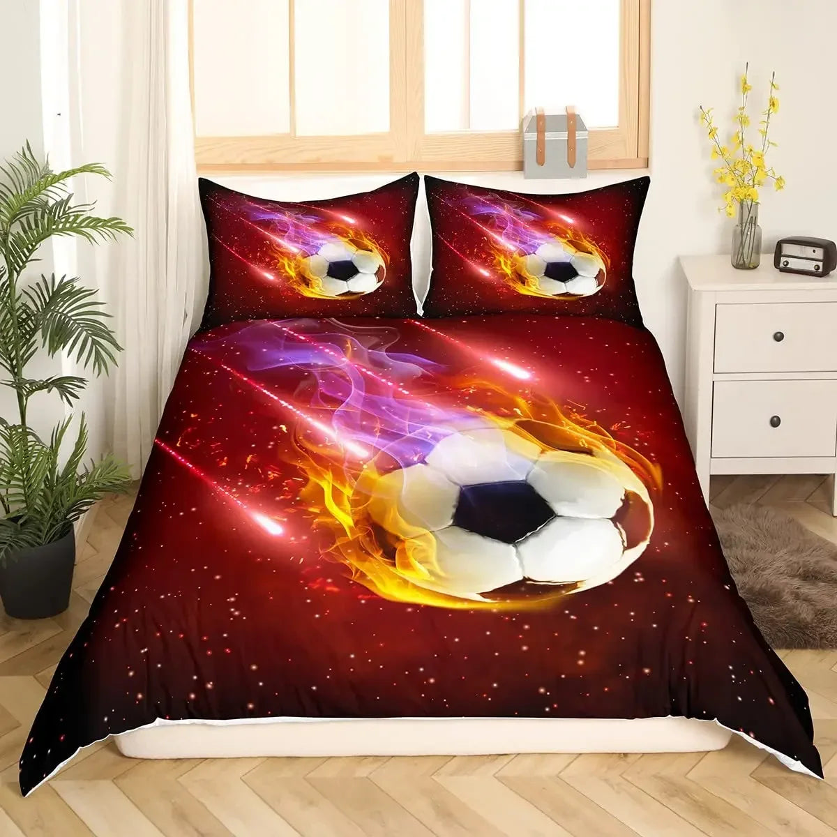 A football themed duvet cover featuring a glowing soccer ball engulfed in red and orange flames against a dark background.