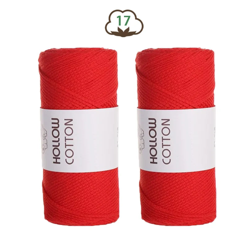 Two spools of red hollow cotton yarn for DIY crafting