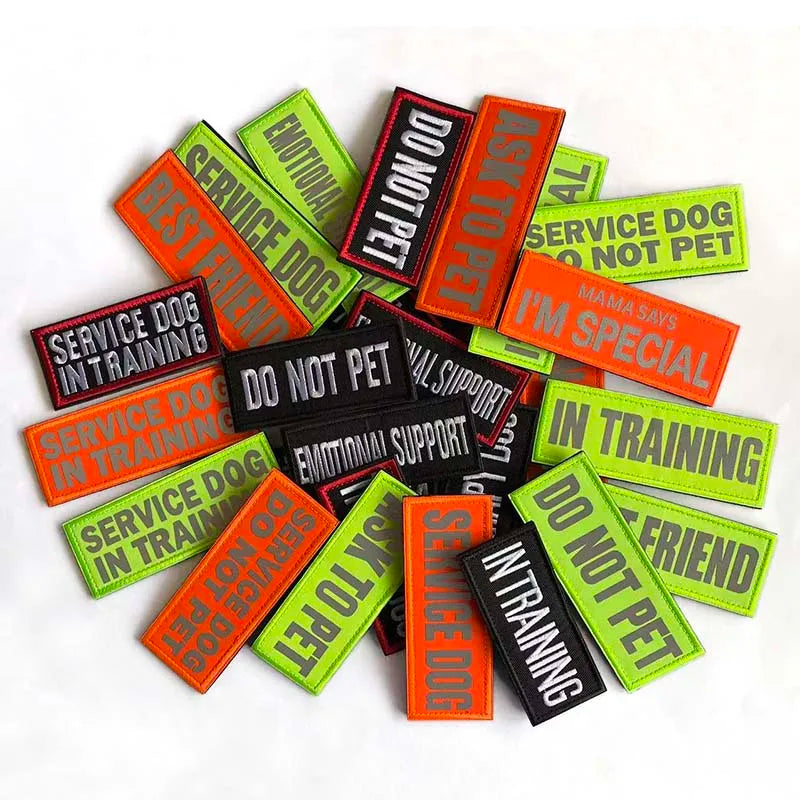 A collection of embroidered patches with text like DO NOT PET and SERVICE DOG in various colors including orange, green, and 