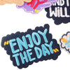 A collection of iron-on embroidered text patches in various colors including purple, red, and blue.