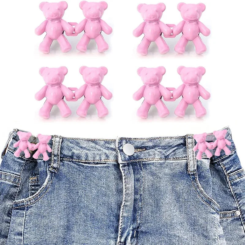 Set of pink bear button pins attached to a denim jean fabric