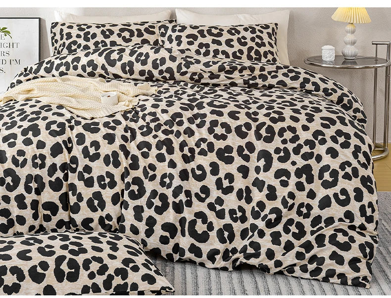 A leopard print duvet cover set featuring black and beige spots on a bed.