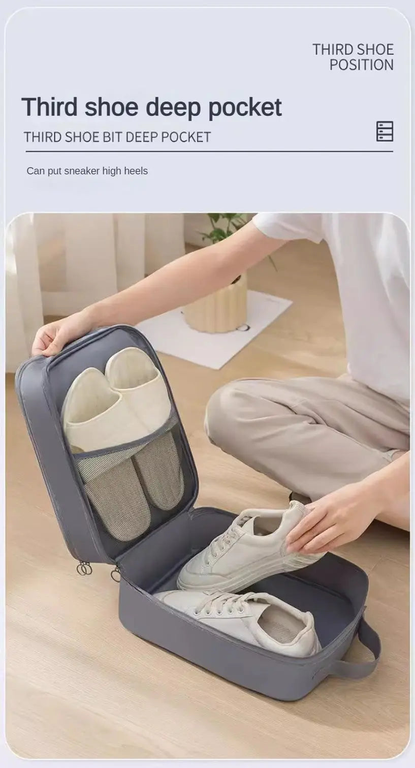 A gray portable travel shoe organizer bag showing a deep pocket designed for storing third shoes.