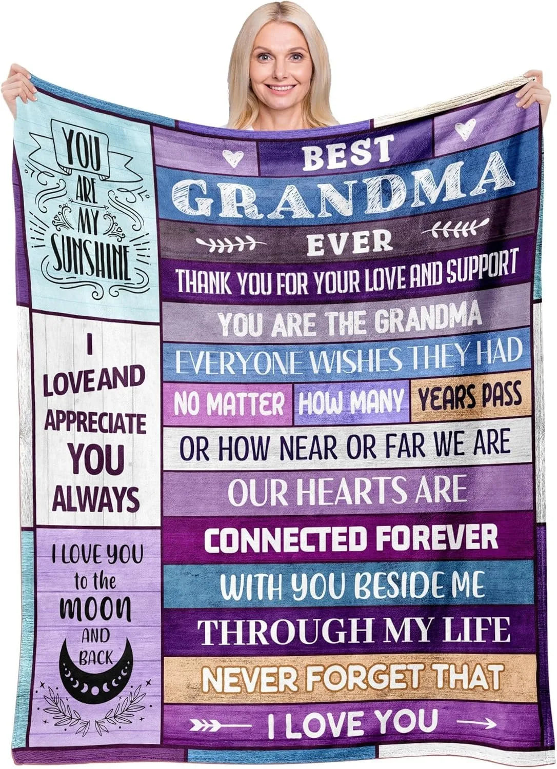 A purple throw blanket with white text expressing love and appreciation for a grandma.