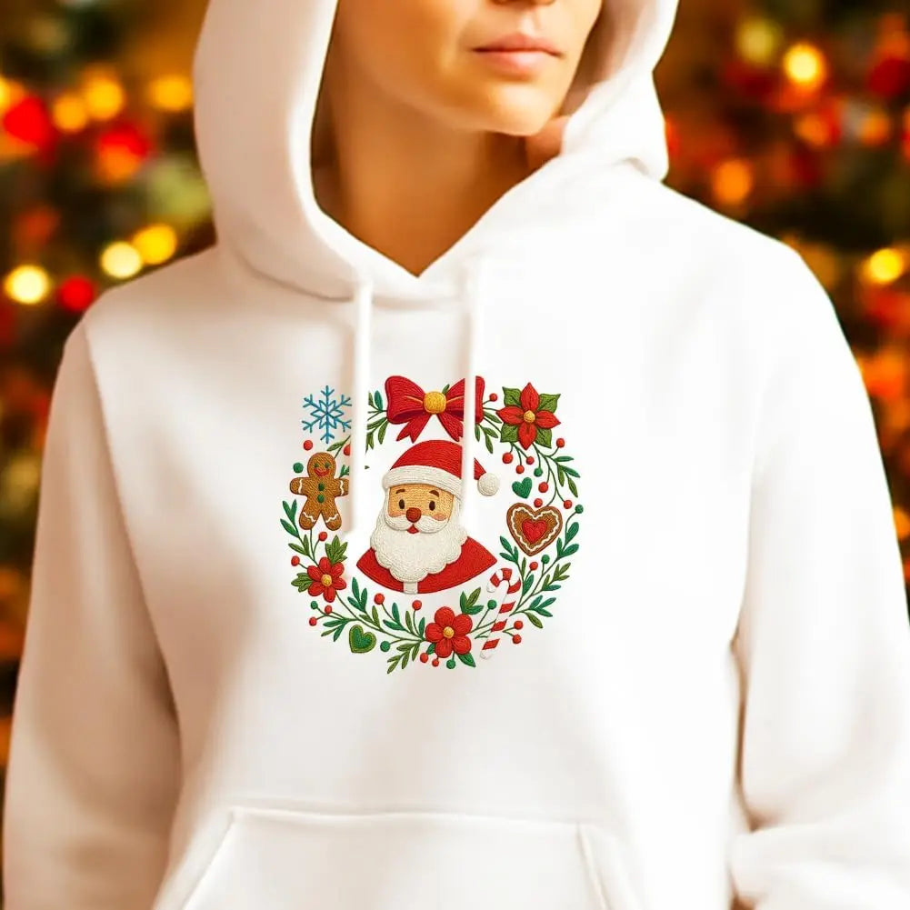 White hoodie featuring a red and white Christmas embroidery design with Santa and holly.