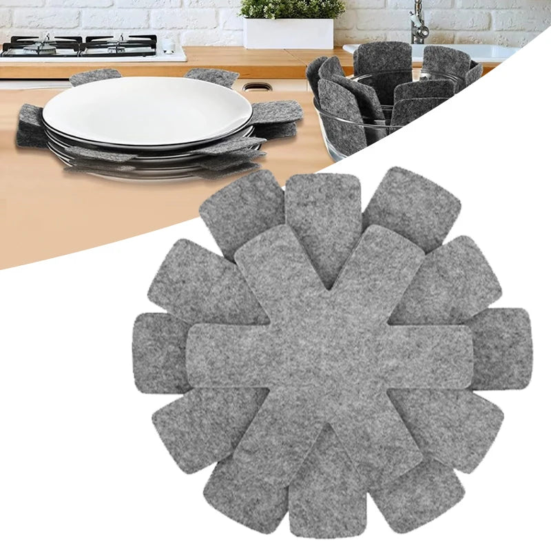 A circular arrangement of grey felt pot protectors used for kitchen storage.
