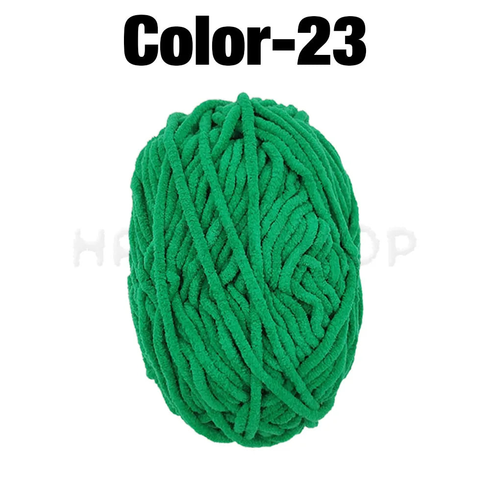 A ball of bright green chenille yarn labeled Color-23 for crafting.