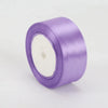 A roll of 4cm satin ribbon in light purple for crafts and gift wrapping.