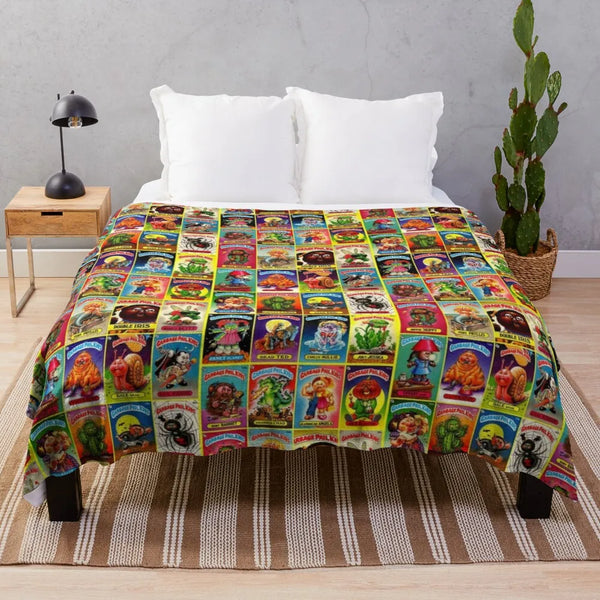 A colorful wool sheep blanket spread out on a floor, next to a white pillow and a wooden nightstand.