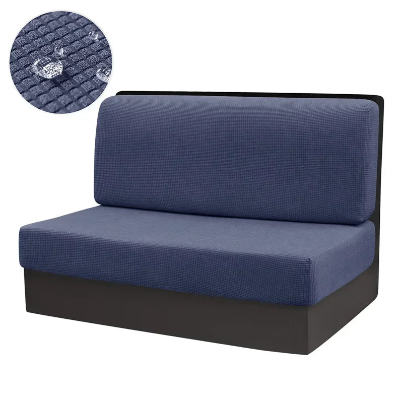 A dark blue stretch sofa and chair cover with a textured pattern shown next to the product.