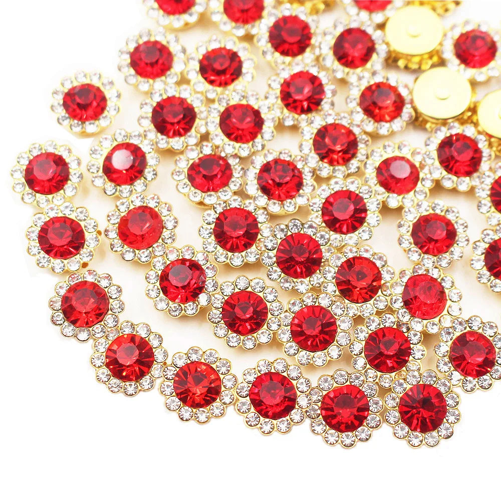 A close-up of sunflower crystal rhinestone sew-on buttons in red and gold.