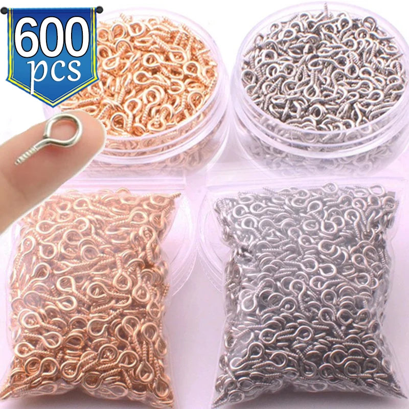 Clear plastic containers show various quantities of stainless steel eye screw pins for jewelry making in rose gold and silver