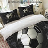 A set of three soccer ball themed duvet cover and pillowcases featuring black and white designs.