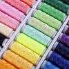 A collection of 39 colors of high-strength polyester sewing thread spools arranged in a white plastic tray.
