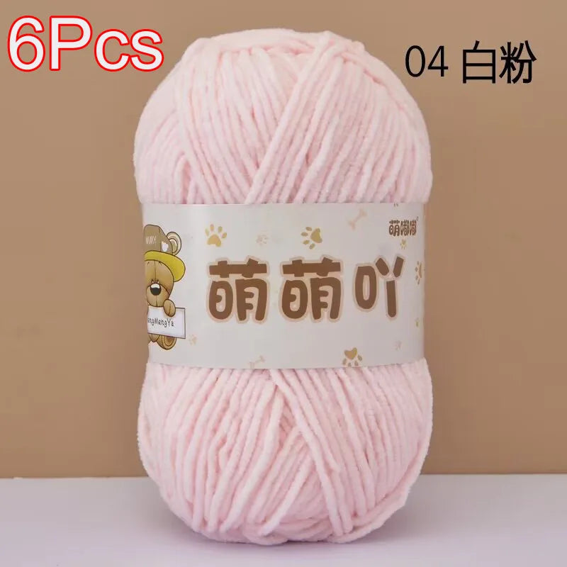 A skein of pink soft bulky chenille yarn labeled in Chinese characters and marked as 6 pieces.