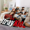 A fleece throw blanket featuring a 3D printed design of the Stray Kids Kpop group members.
