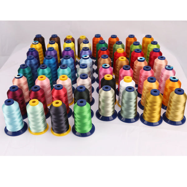 A collection of high-quality polyester embroidery thread in various shades of yellow, orange, red, and blue.