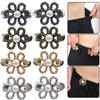 A collection of adjustable metal waist clips in various finishes and designs for pants and jeans.