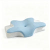 Light blue cooling memory foam cervical pillow with white accents for neck pain relief