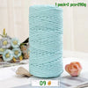 A spool of light blue medium-thick hand-woven cotton yarn for crafting, packaged as 1 pack of 2 pieces.