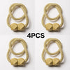 Four sets of gold-colored magnetic curtain tiebacks with hexagonal accents