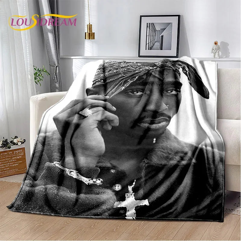 A black and white vintage-inspired graphic throw blanket featuring a close-up portrait of a man's face.