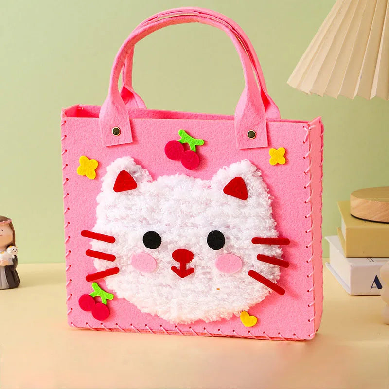 Pink tote bag featuring a white cat design with red accents and small fruit decorations.