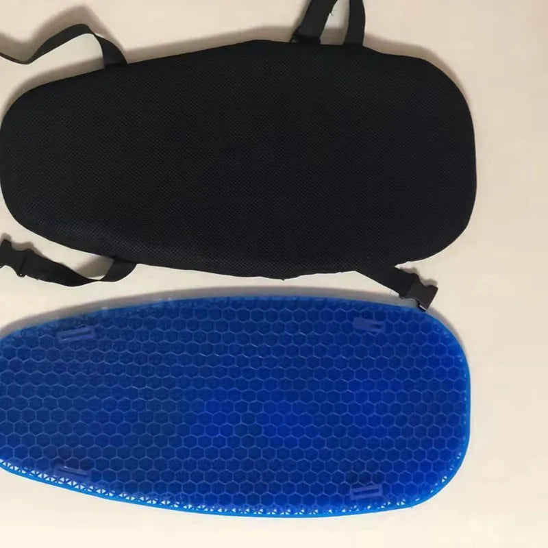 A black ergonomic cooling seat cushion and a blue perforated mat are displayed on a white surface.