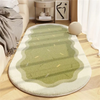 A light green oval rug with striped texture placed on a wooden floor.