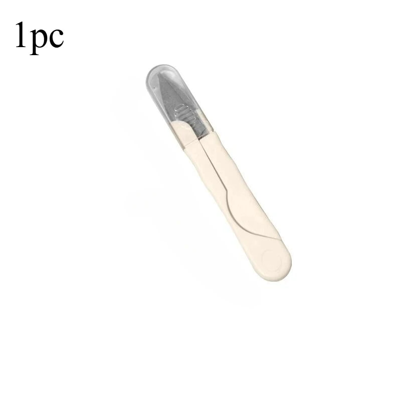 A single stainless steel sewing and embroidery scissors set shown in a profile view.