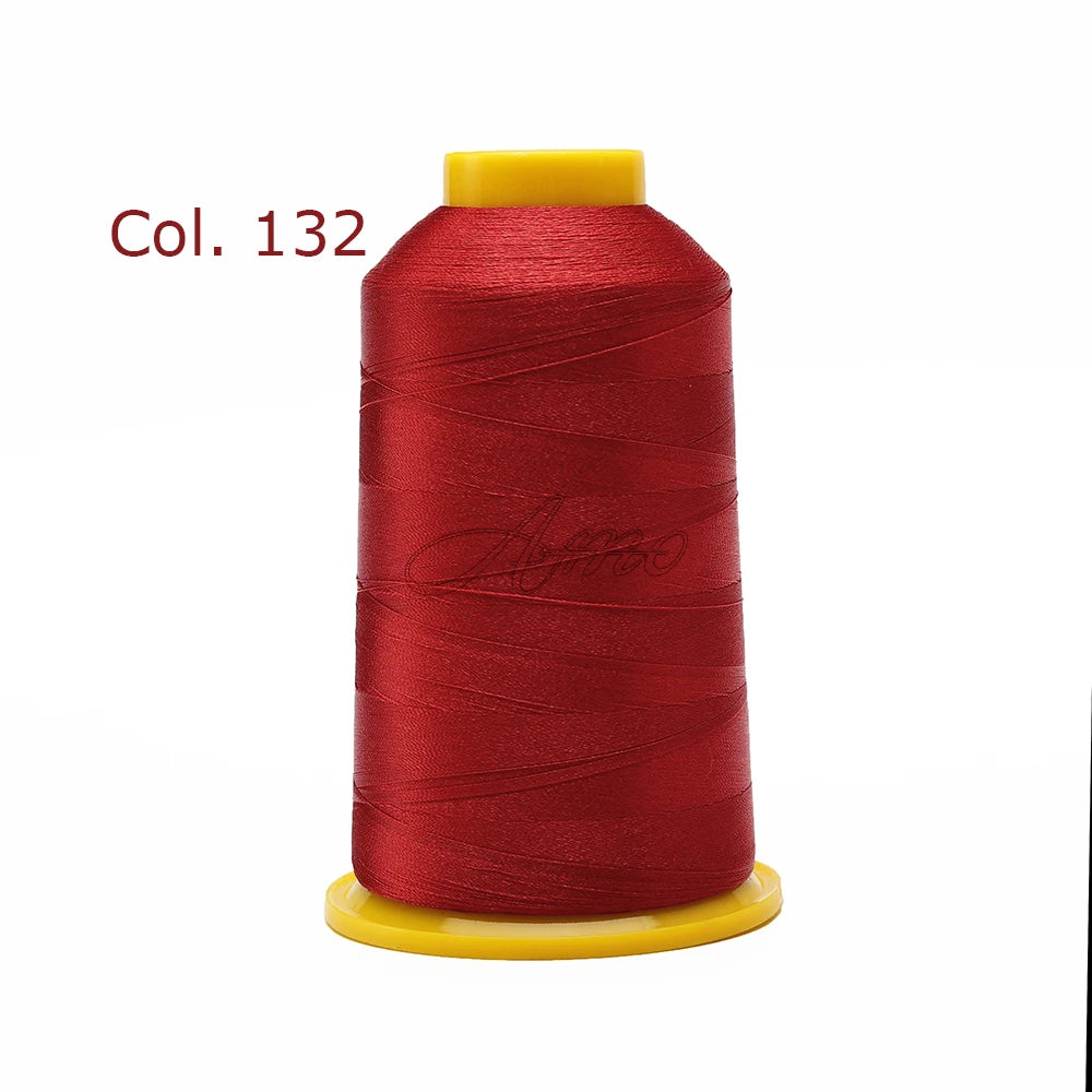 A spool of red embroidery thread labeled Col. 132 on a yellow bobbin.