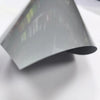 A sheet of gray heat transfer vinyl for apparel, shown at an angle against a white background.
