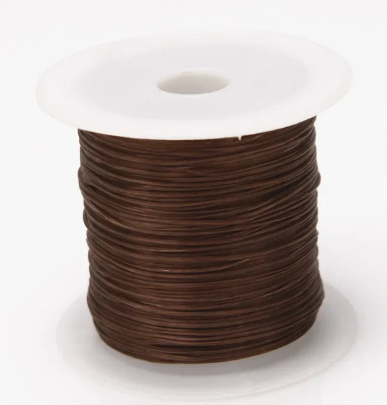 A spool of brown multicolor elastic beading cord with a white plastic core.