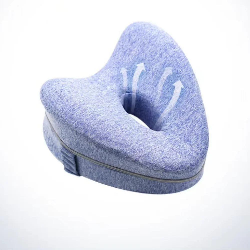 A light blue memory foam heart-shaped pillow designed for side sleepers and pregnancy support.