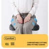 A person is sitting on a gray ergonomic seat cushion, demonstrating the fitting curves for comfortable sitting.